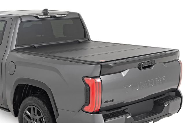 Rough Country Hard Tri-Fold Flip Up Bed Cover | 5'7" | Toyota Tundra 2WD/4WD (2022-2026)