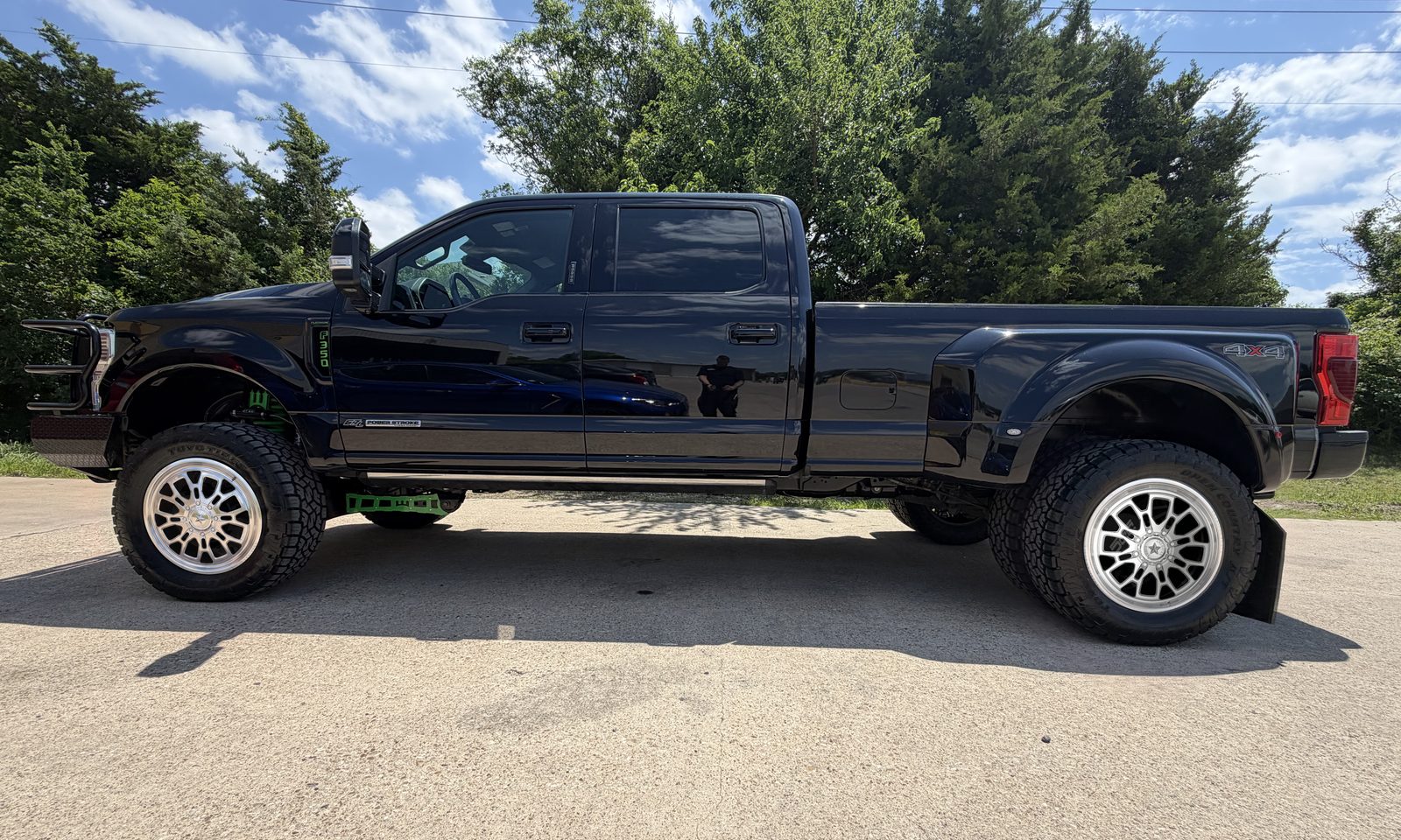 The same truck rendered with polished American Force wheels